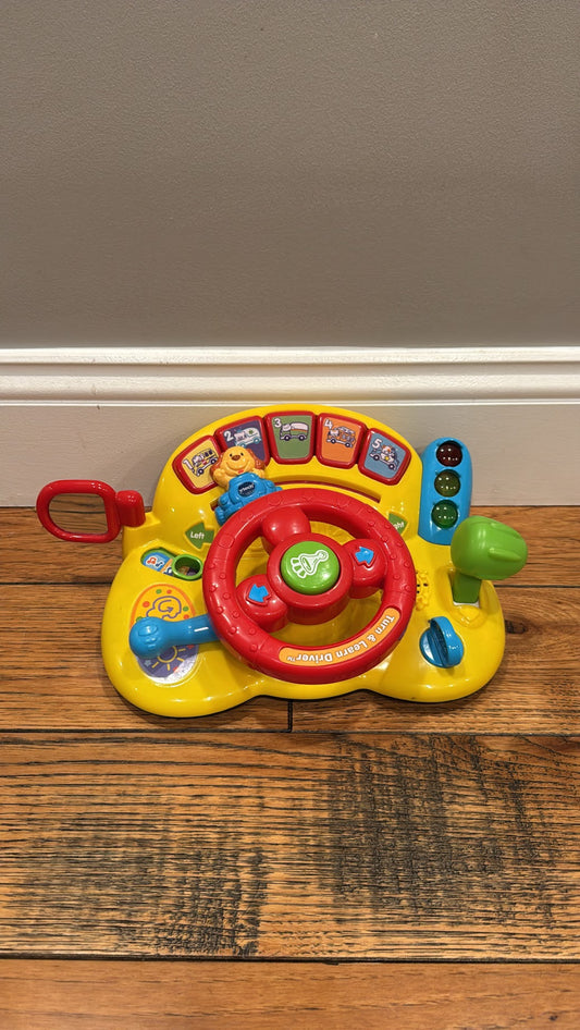 #145 Vtech toy racing wheel