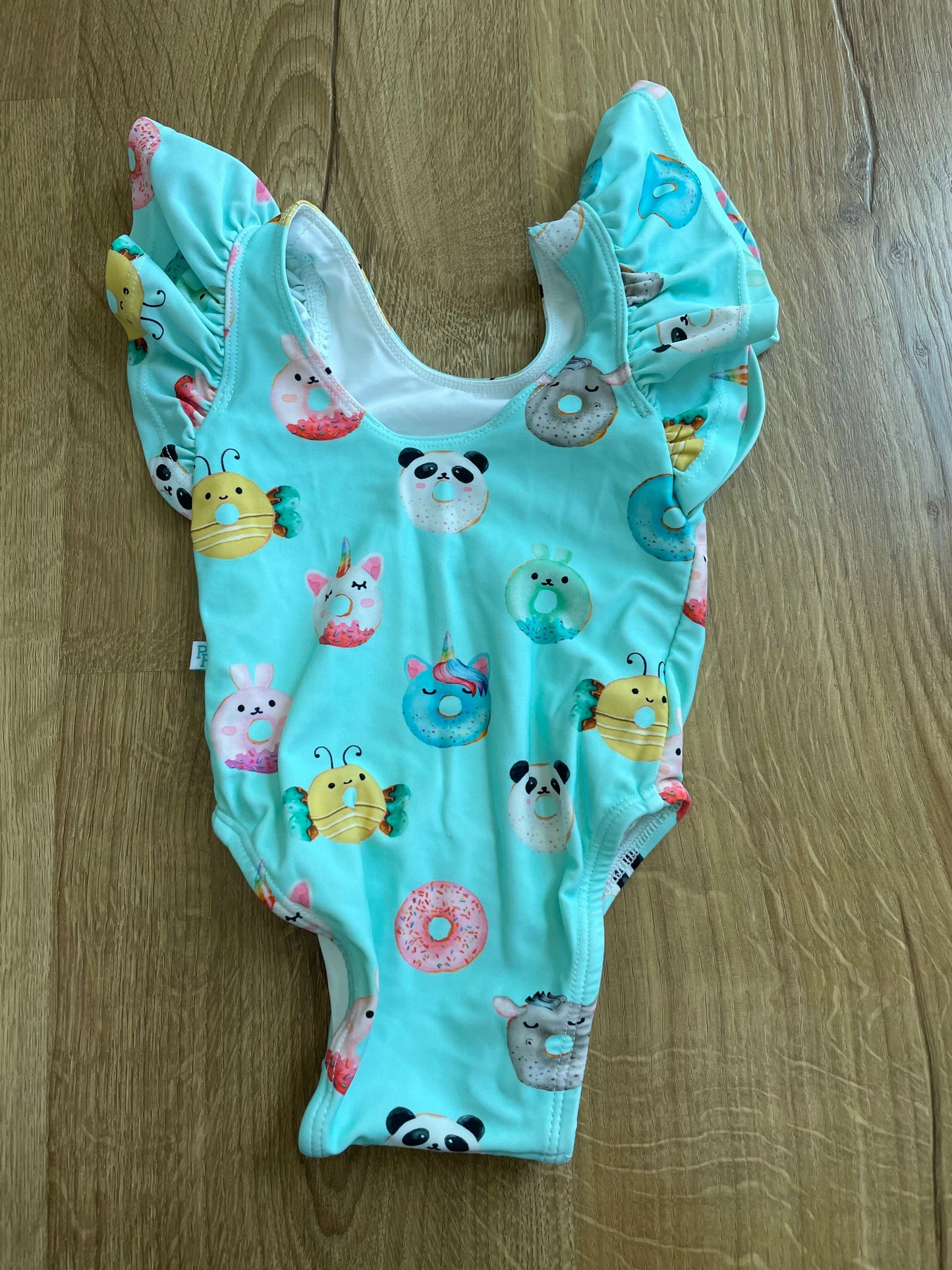 #6 - Posh Peanut Girls Ruffle Swimsuit, 3-6months, teal with donuts