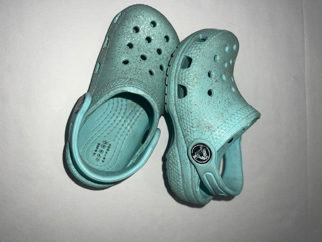 #78 girls 6c Crocs light blue with sparkles