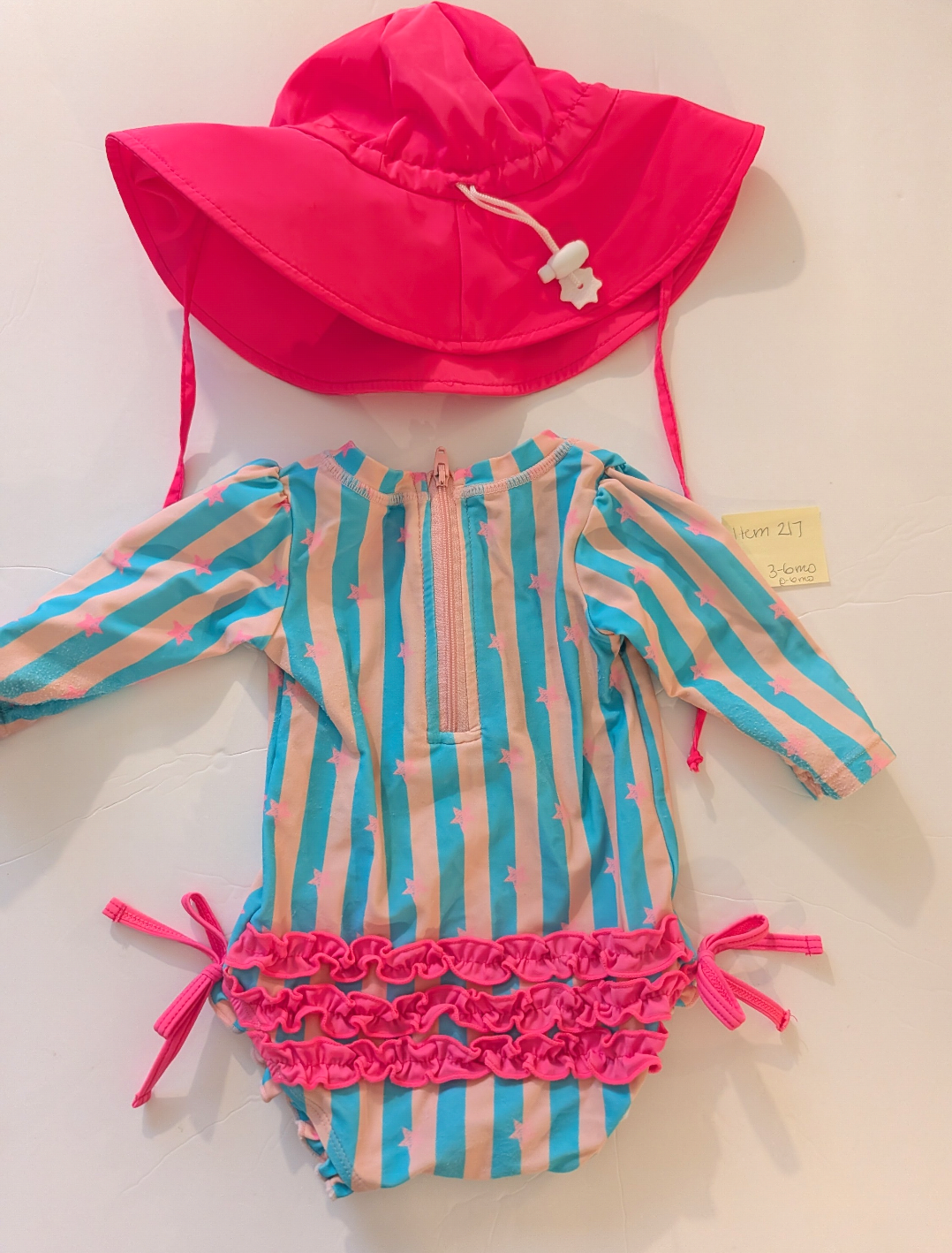 Seller 97, Ruffle Butts Pink & Blue Striped Swimsuit w/Pink Stars & Matching Pink Hat, baby, size 3-6mo (item 217)