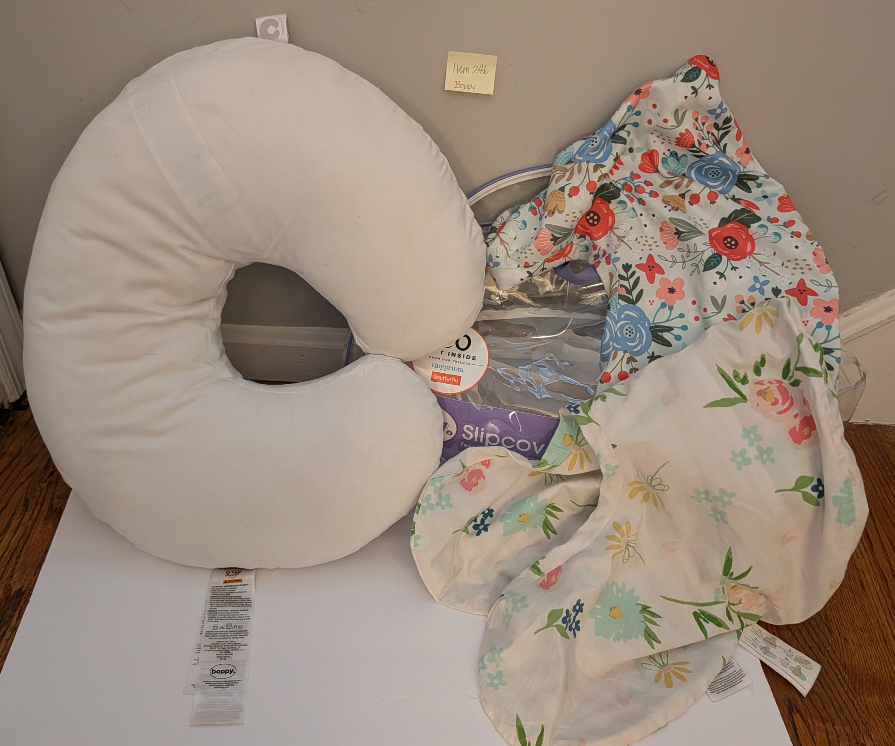 Seller 97, Boppy Nursing Pillow w/2 covers (item 246)