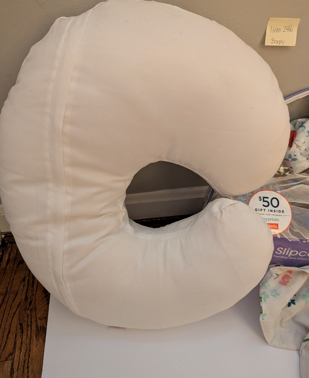 Seller 97, Boppy Nursing Pillow w/2 covers (item 246)