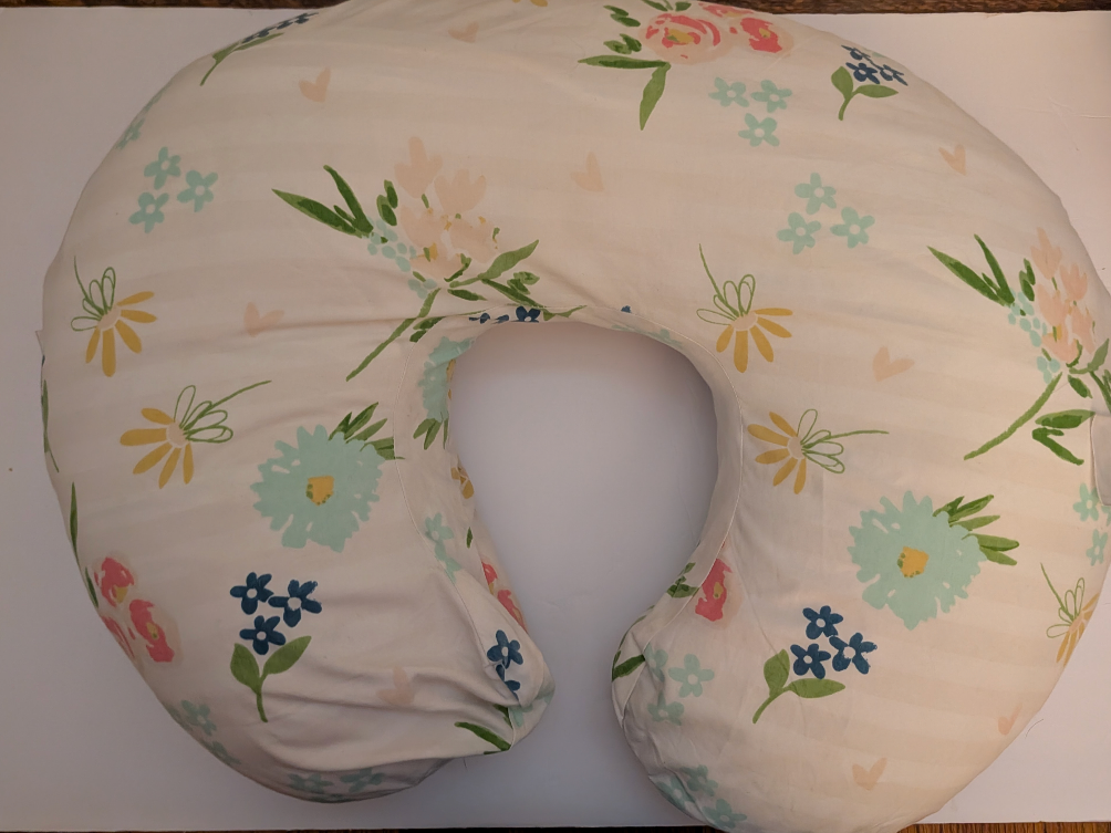 Seller 97, Boppy Nursing Pillow w/2 covers (item 246)