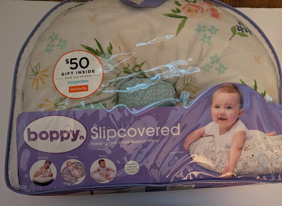 Seller 97, Boppy Nursing Pillow w/2 covers (item 246)