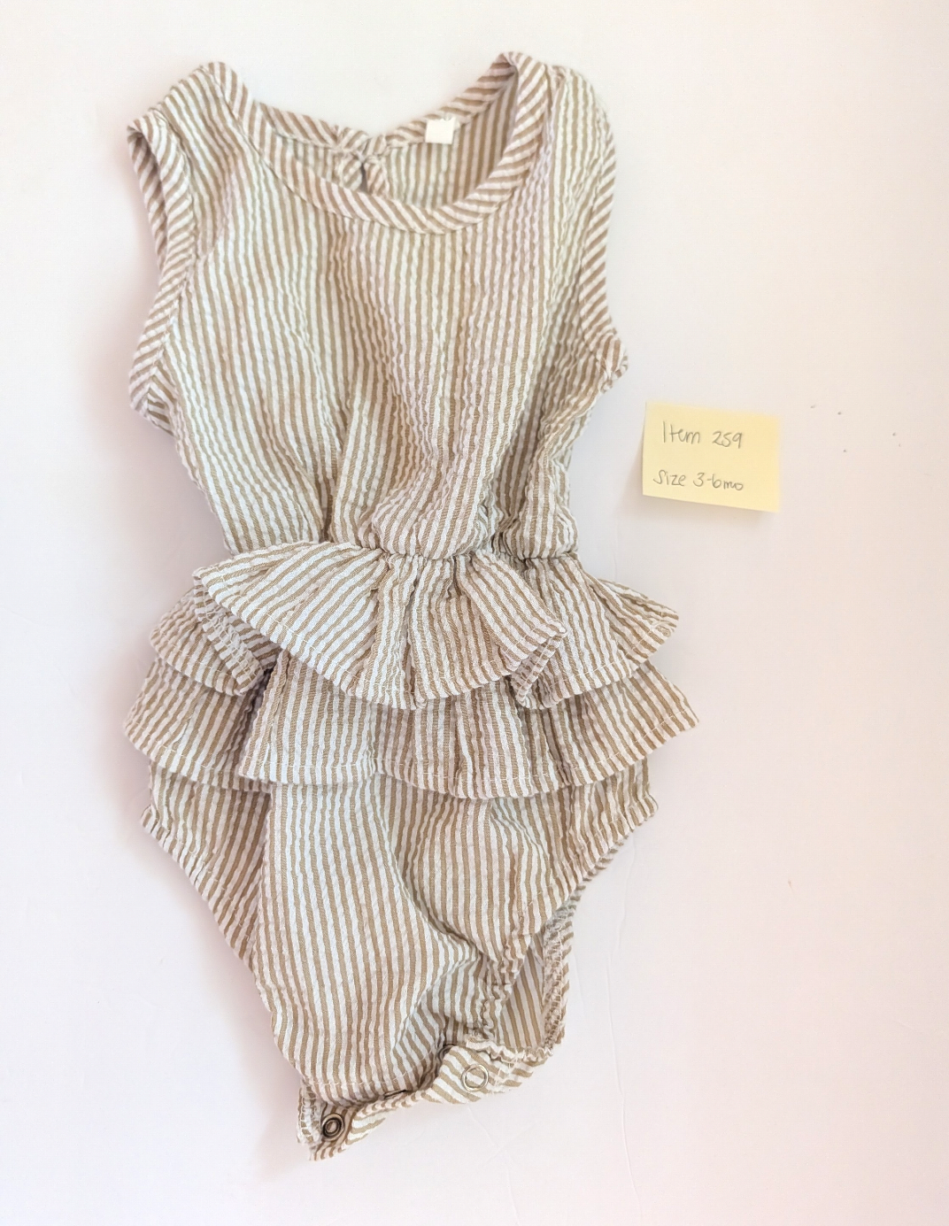 Seller 97, Tan Seersucker w/Ruffle Onesie, baby, size 3-6mo (item 259)
