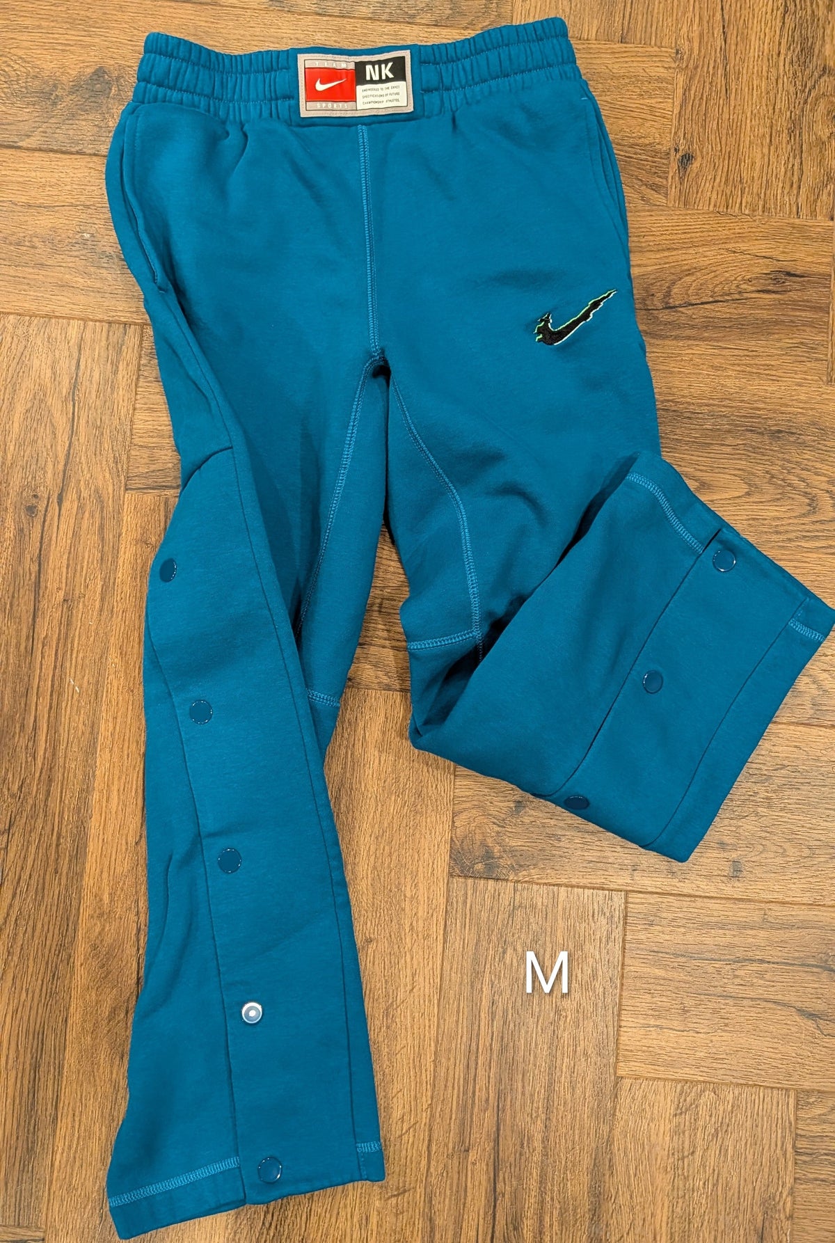 #3 Nike teal size M basketball sweatpants, like new
