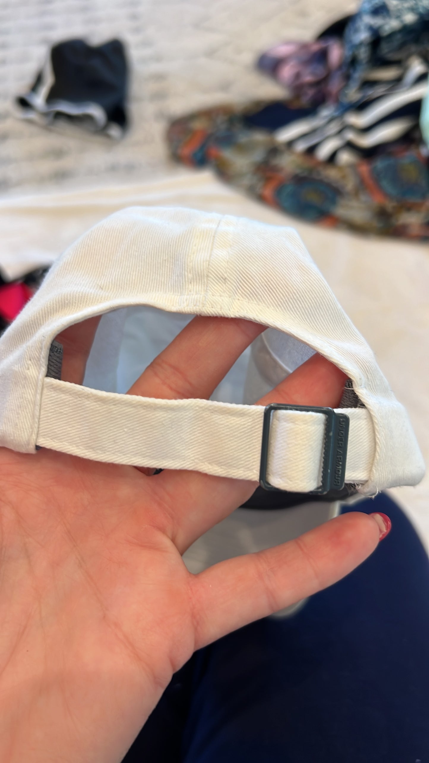 Toddler UA hat 1-3 years, very faint spot, adjustable back