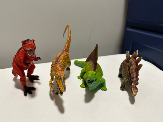 Lot of 4 6-8” Heavy Plastic Dinosaurs