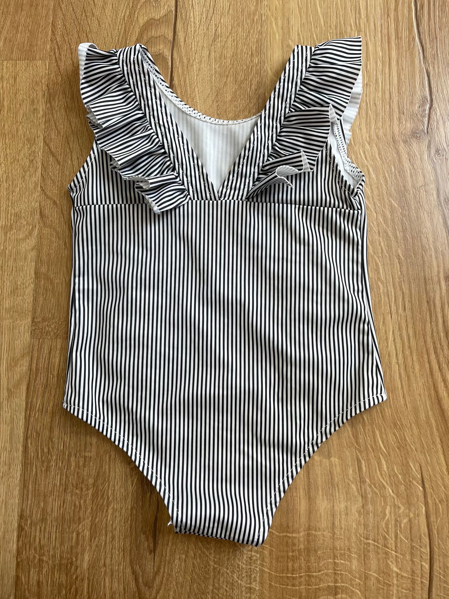 #6 - Girl's 1 Piece Ruffles Swim Suit, Black and White Striped, 18-24 months