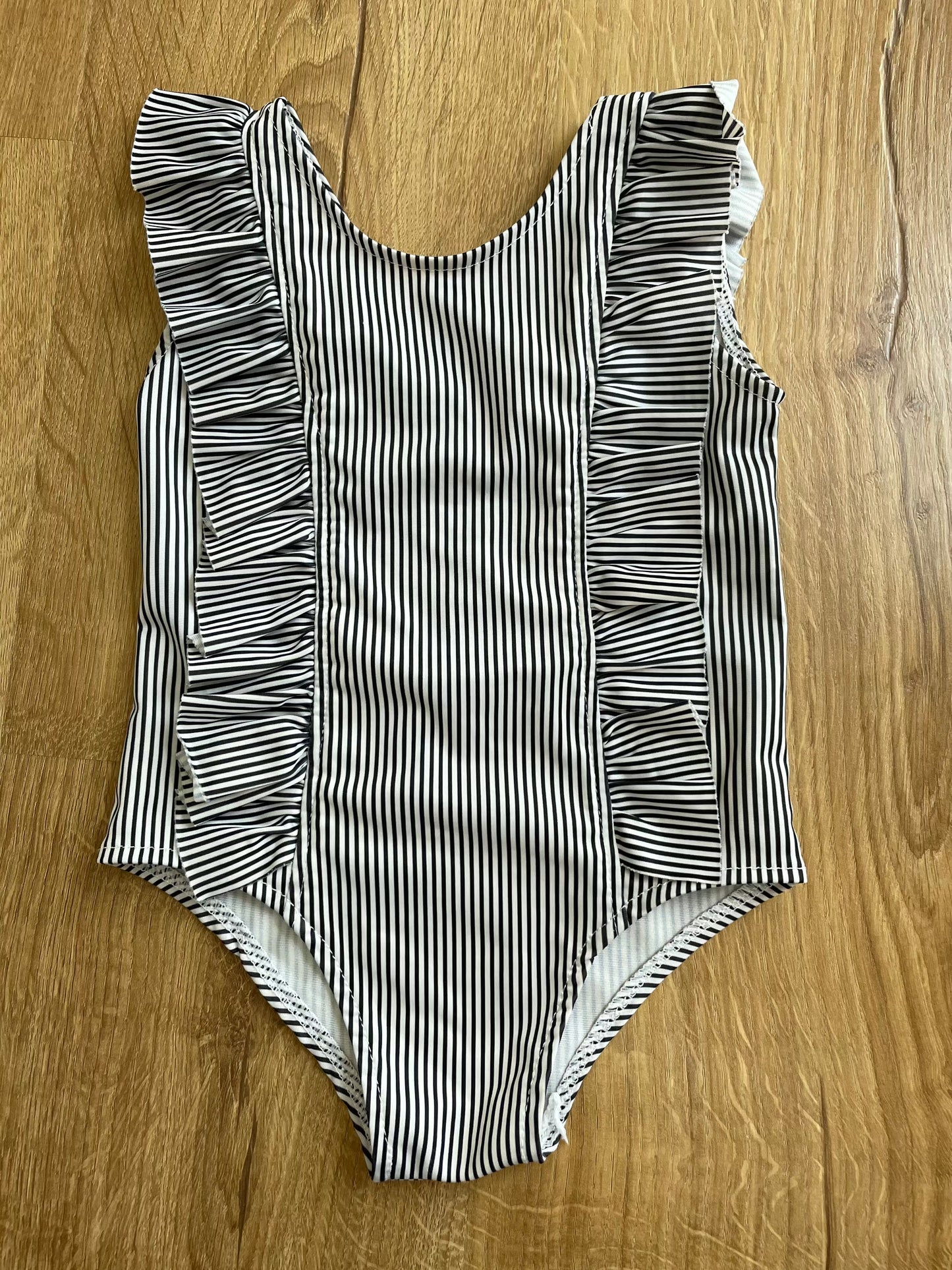 #6 - Girl's 1 Piece Ruffles Swim Suit, Black and White Striped, 18-24 months