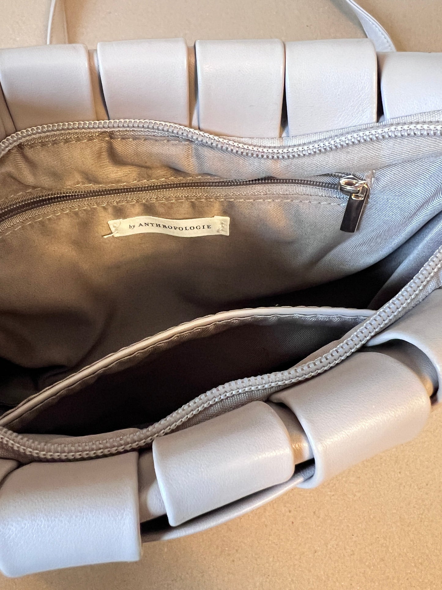 #176 - Anthropologie taupe woven crossbody