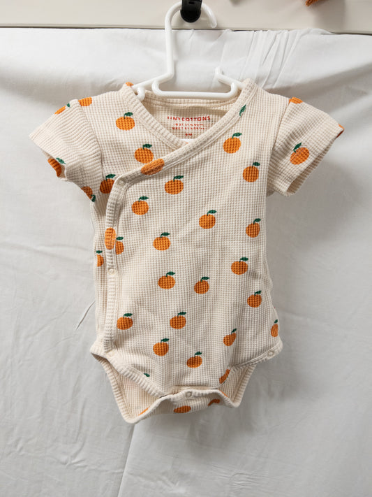 #151 girls orange onesie 9 month tiny cottons EUC