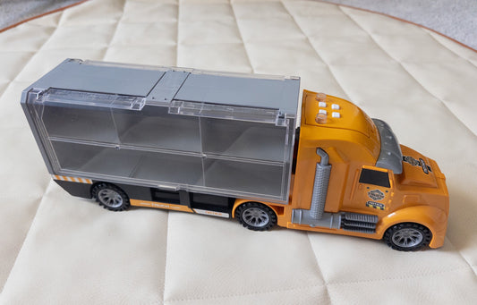 #152 semi truck toy with car storage - EUC