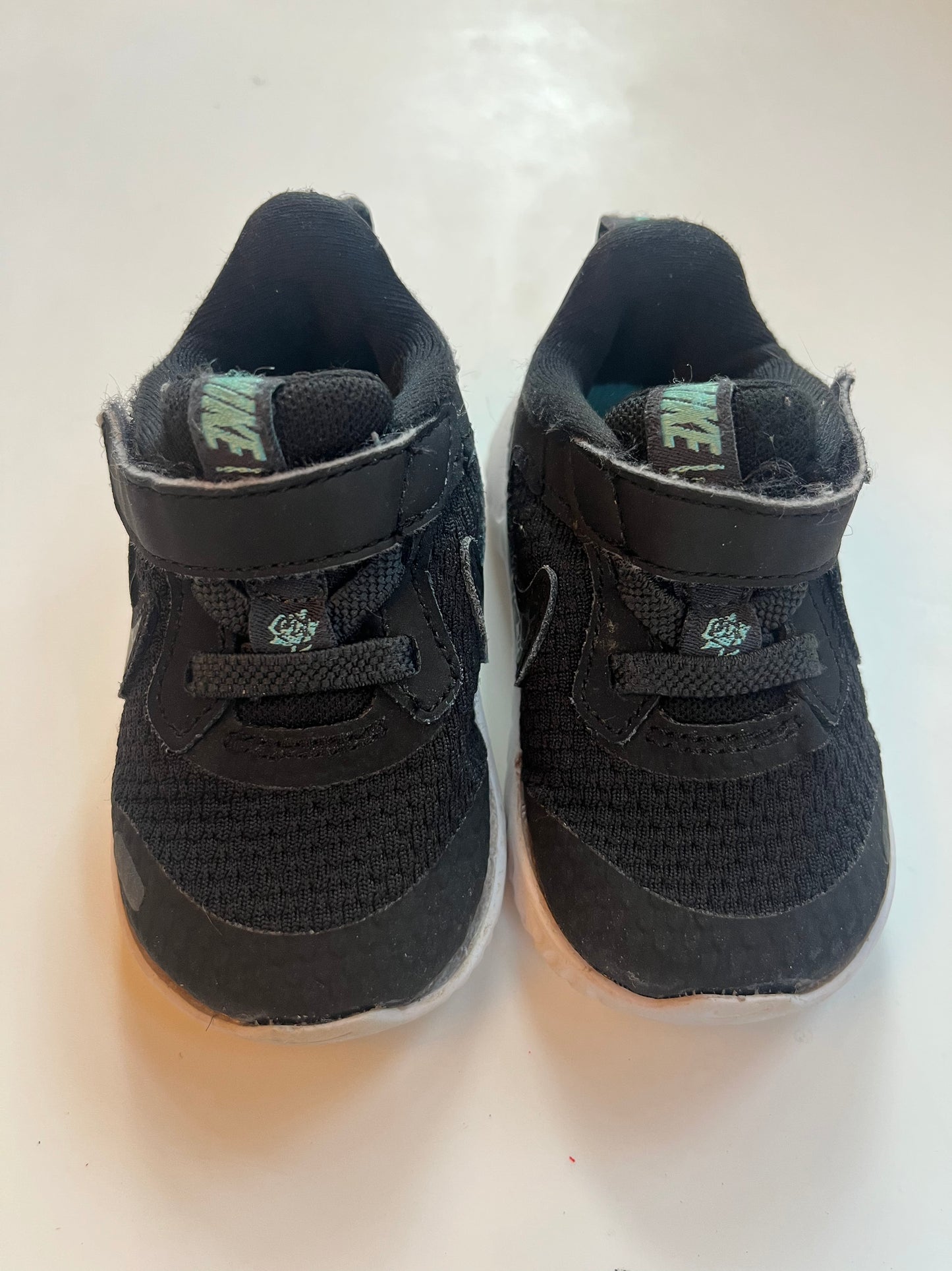 Seller #20 black Nike size 4c