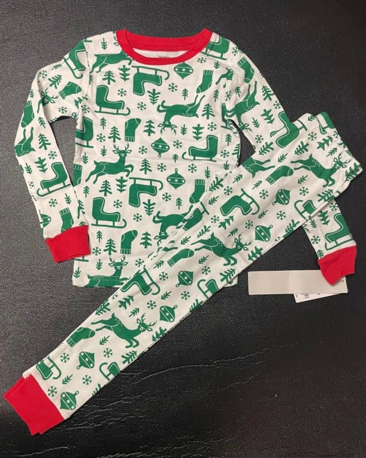 New size 6 Carters Christmas PJs.