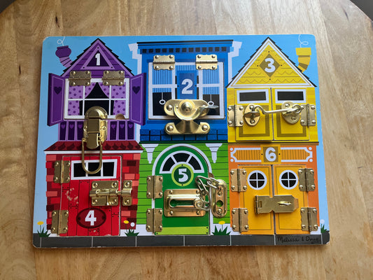 #97- Melissa and Doug Latches Board