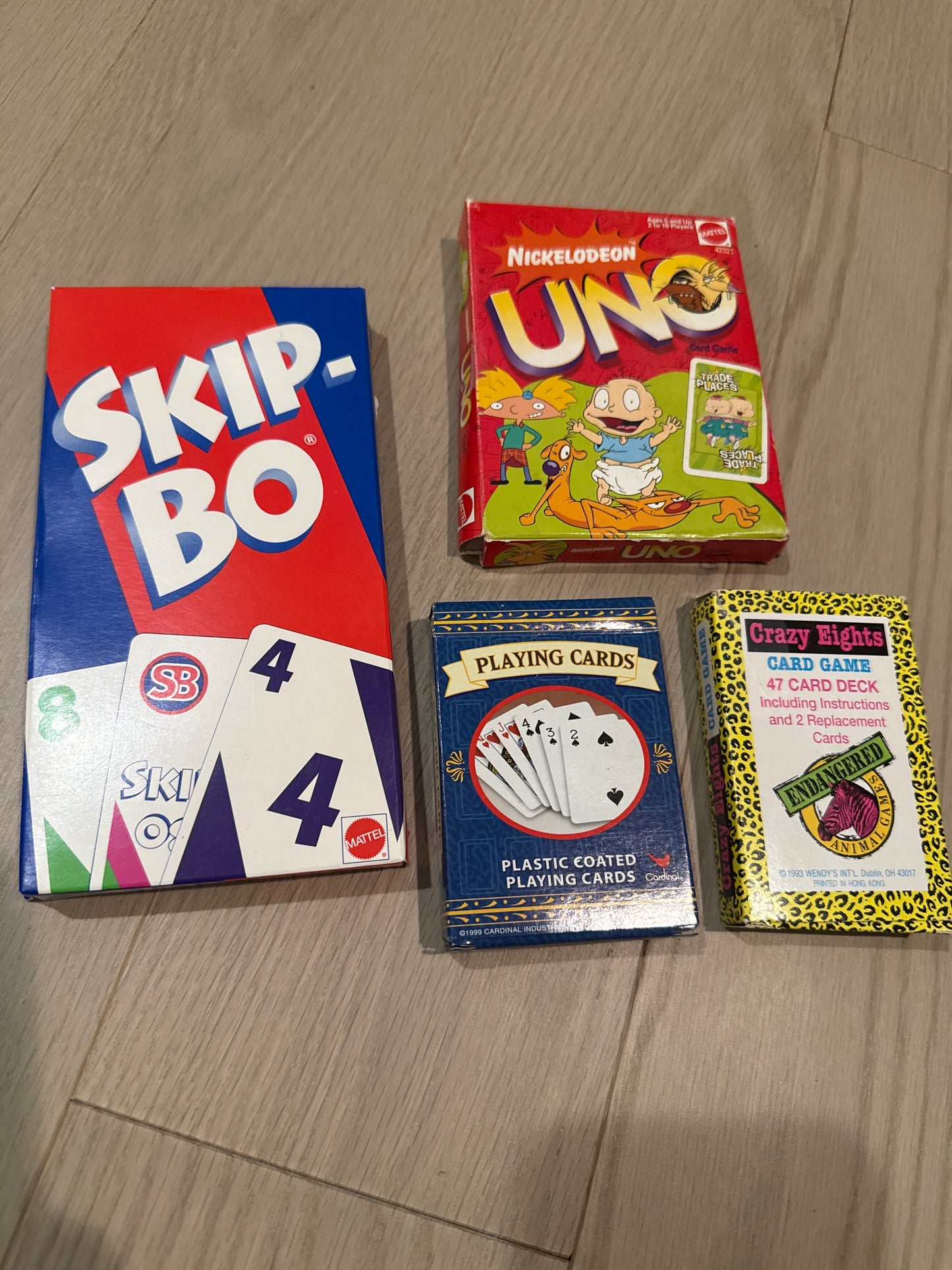 Seller #216 Bundle of card games - Skip-Bo, UNO, Crazy Eights and playing cards