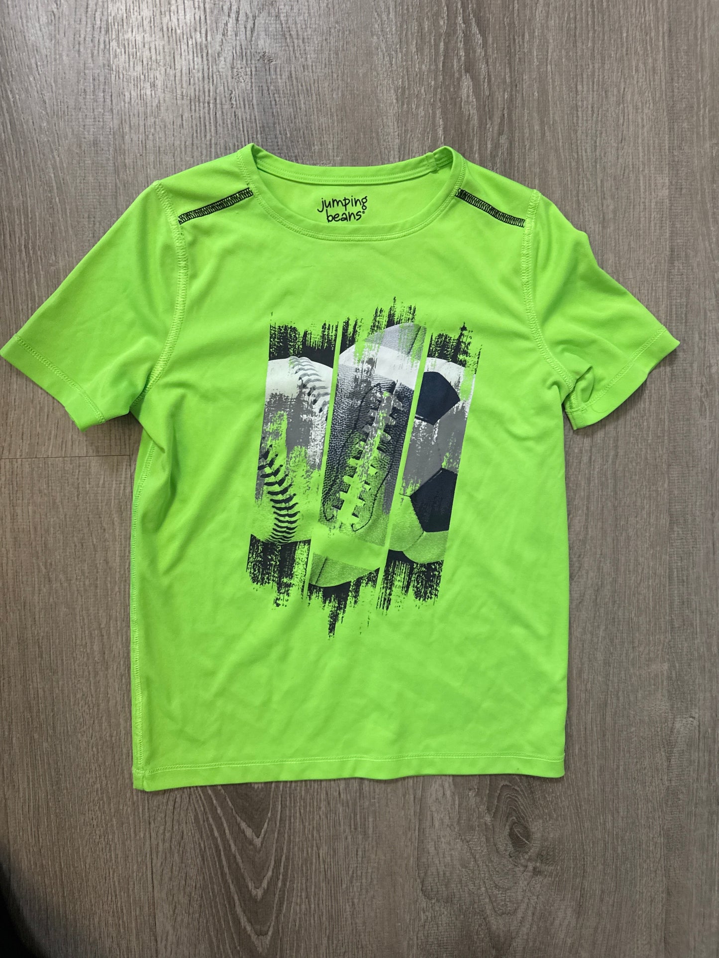 Seller #149 Boys Jumping Beans sports shirt size 7