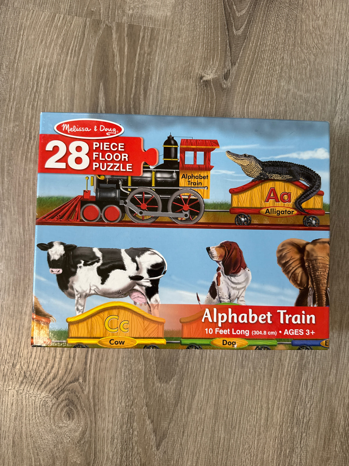 #149 Melissa and Doug alphabet train floor puzzle