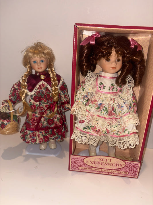 #182 two porcelain dolls