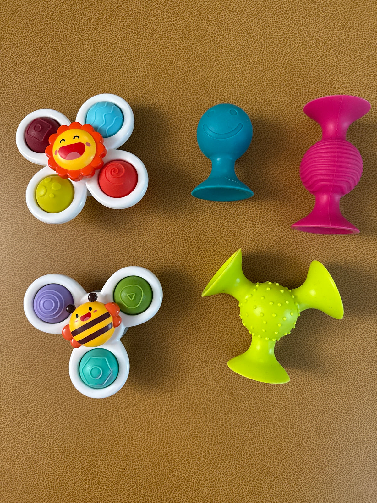 #87 Baby suction rattles and pop spinners