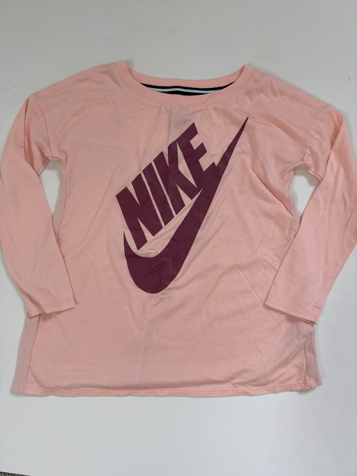 #64 Nike LS Size XS (4) runs big