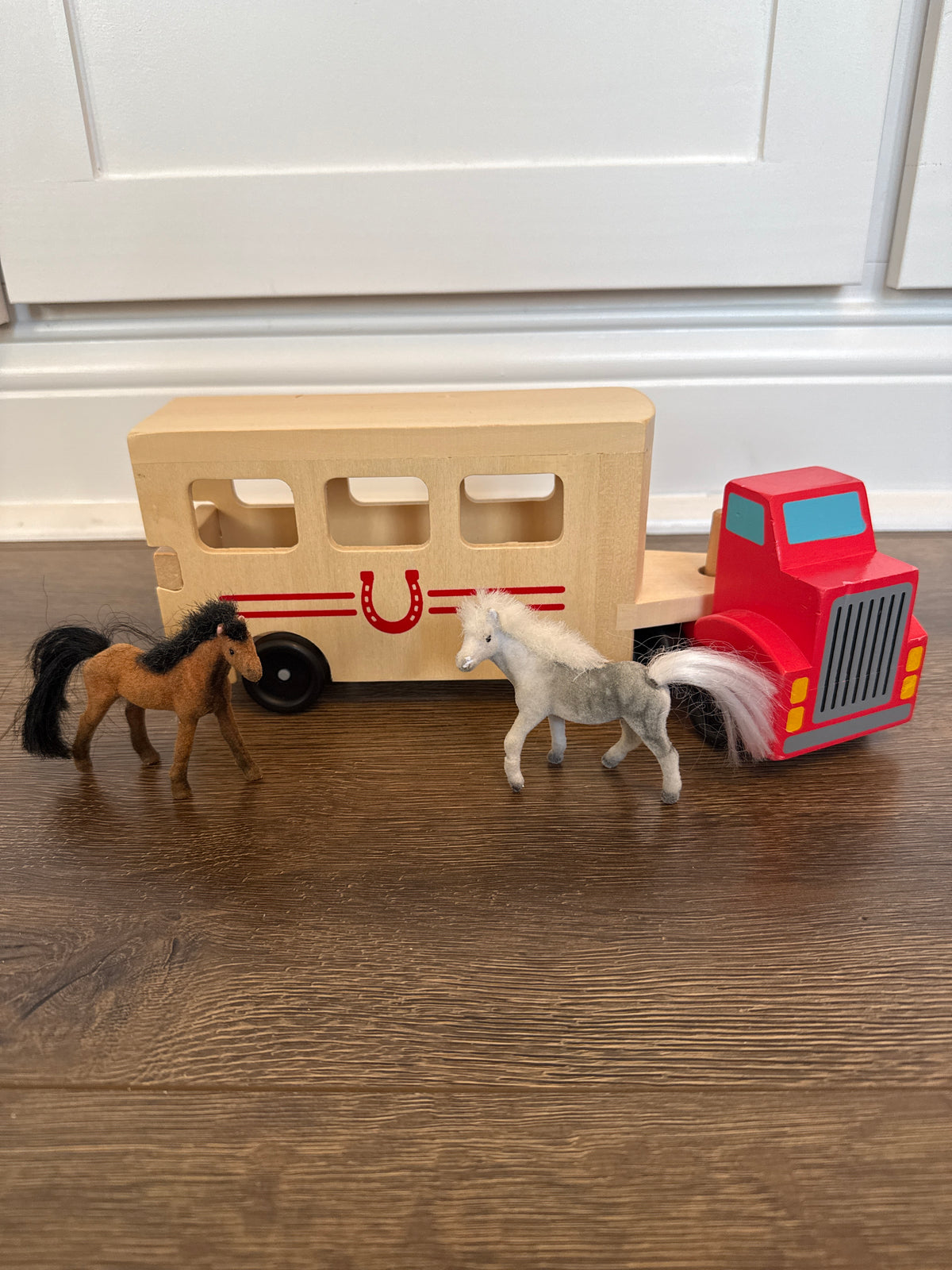 #173 Melissa & Doug wooden horse carrier