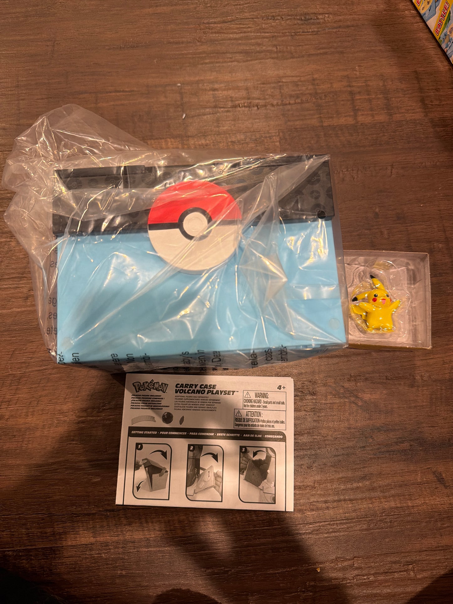 #107 new, not in box Pokemon carry case volcano playset