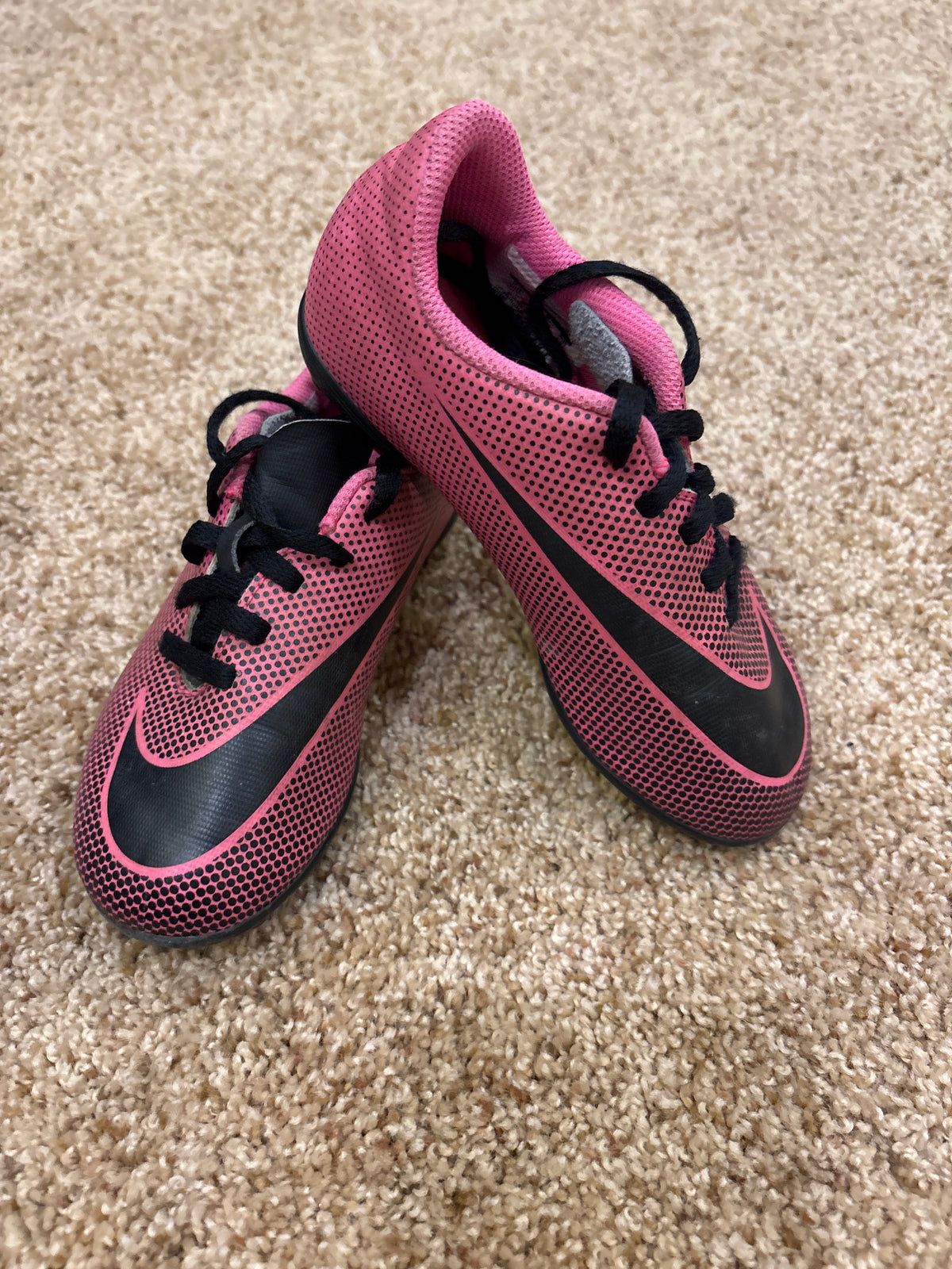 #47 girls Nike pink/black soccer cleats Kids Size 11