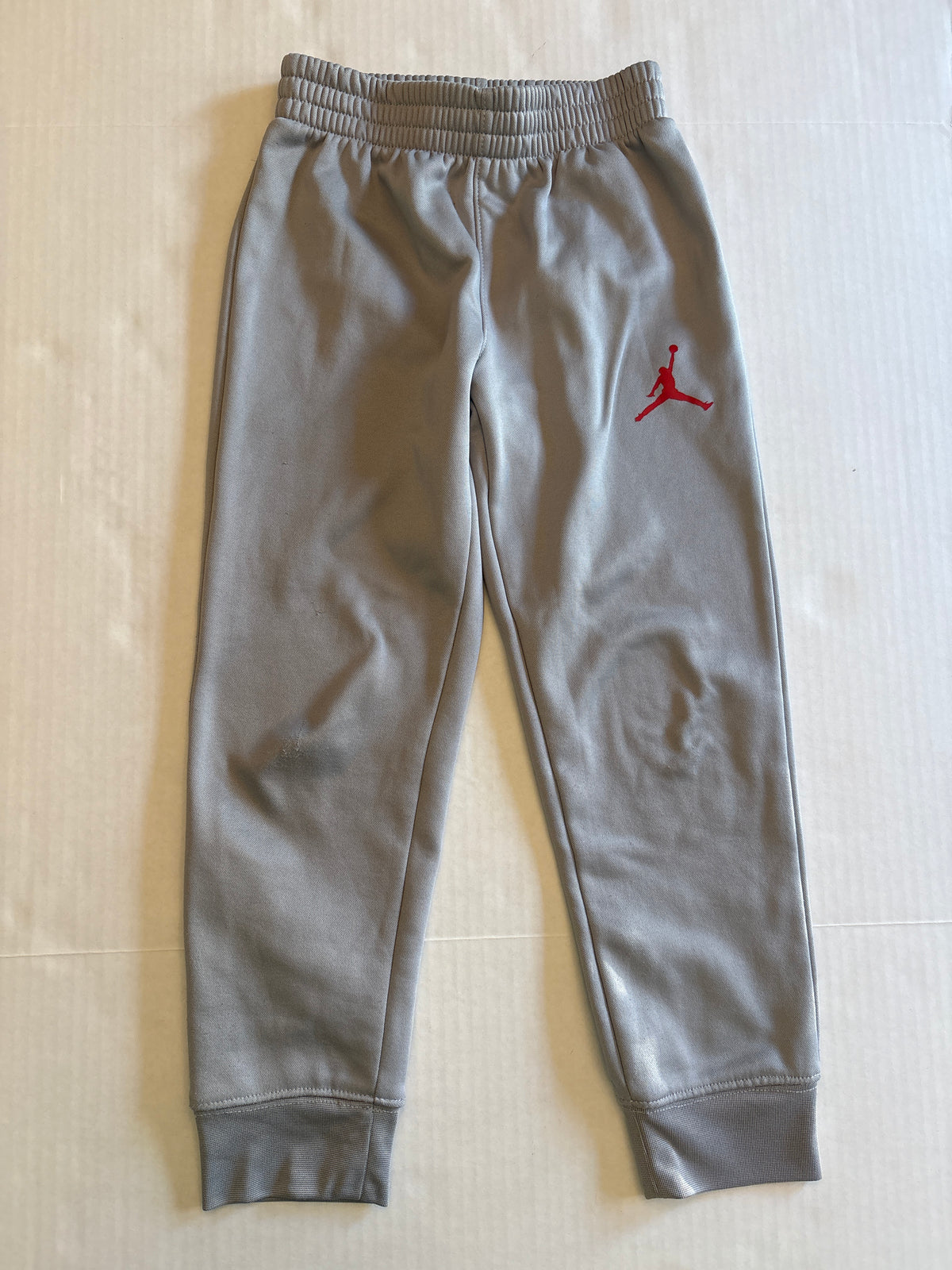 Seller 118 GUC For snags in knee(see photo) Nike Jordan Gray Joggers Size 7
