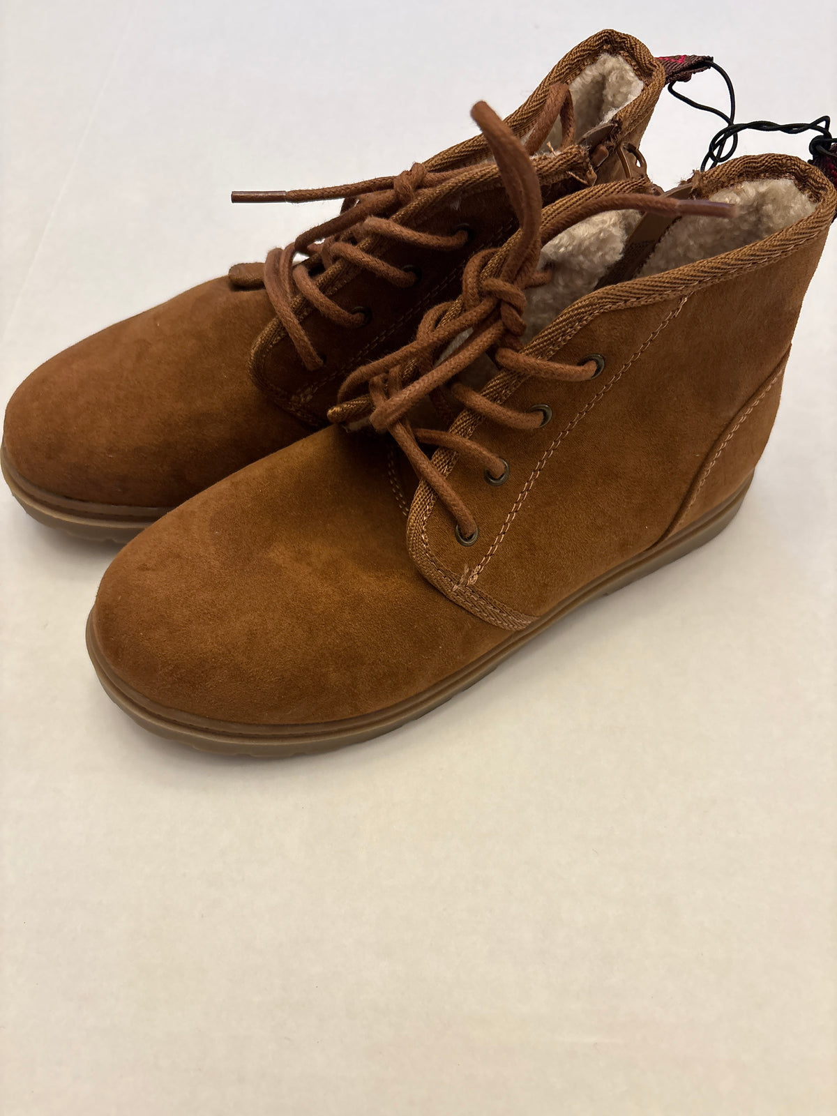 Seller 118 NWT Boys Cat and Jack tan boots with fuzzy lining. Size 2