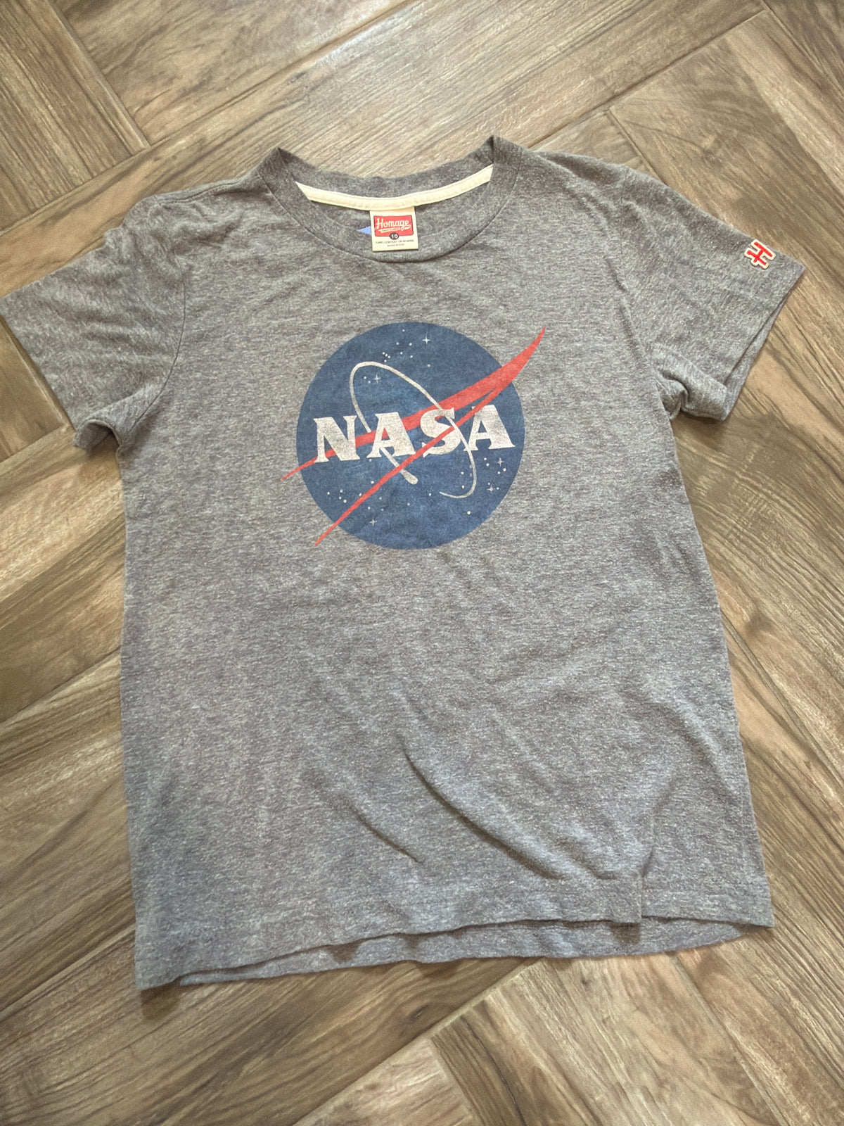 #198 Homage Size 10 tee