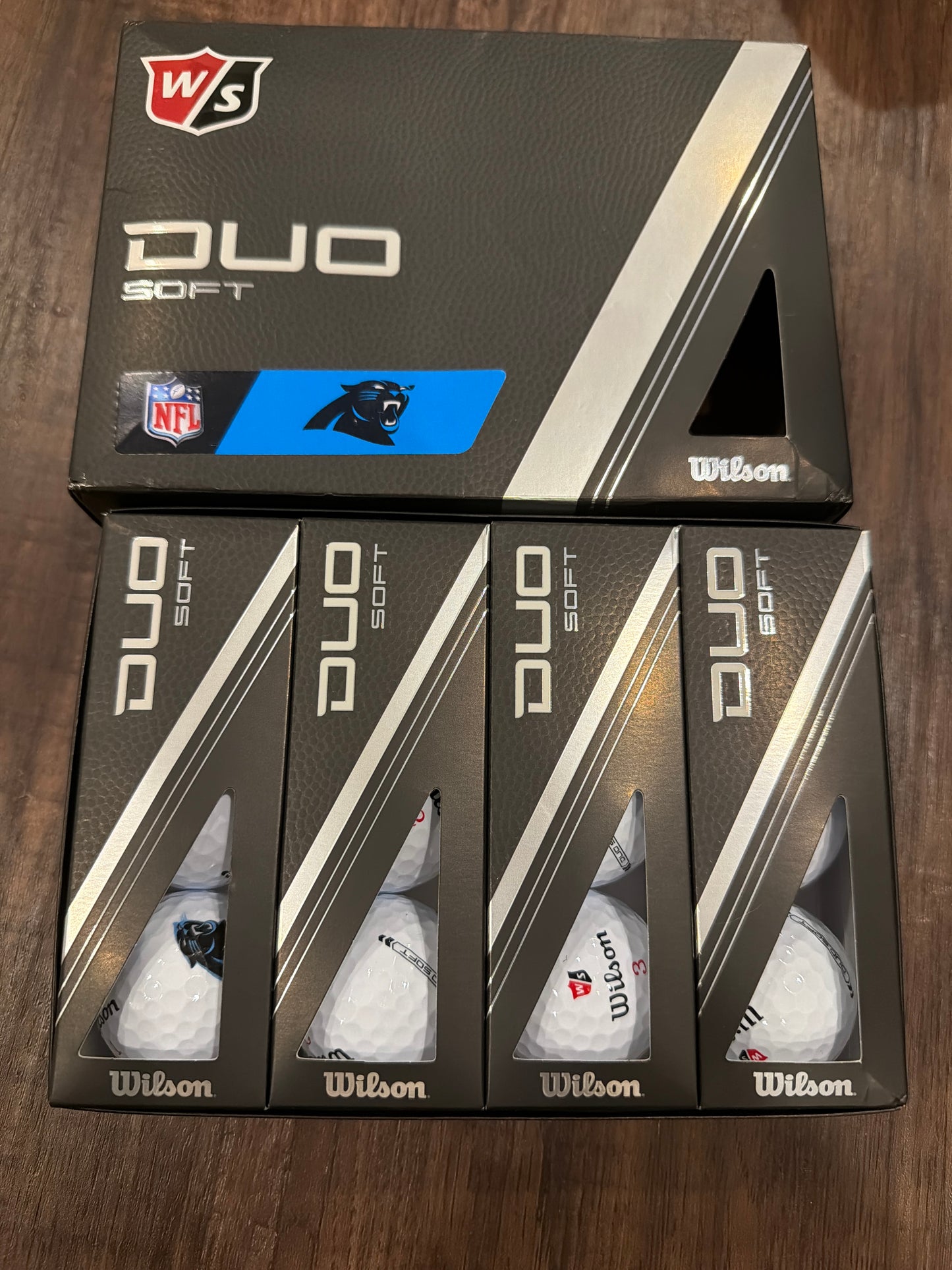 #107 new Wilson Dup Soft Carolina Panthers golf balls