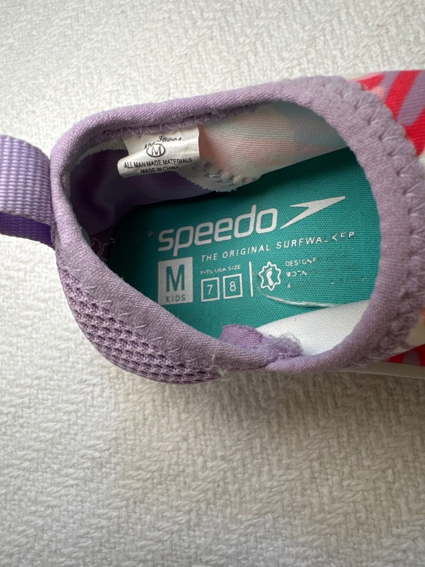 Seller #127 Speedo swim shoes size 7/8