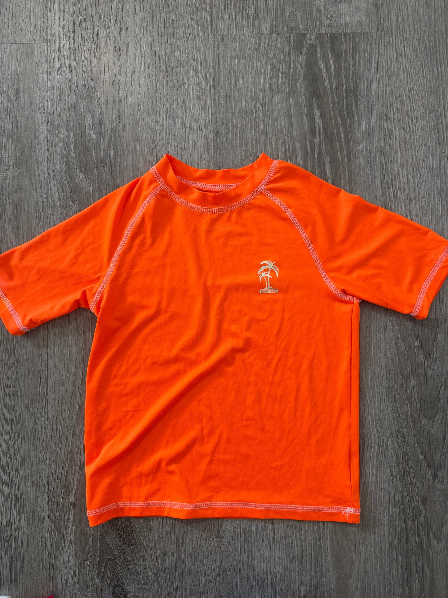 #149 Boys size 7 Neon orange rash guard