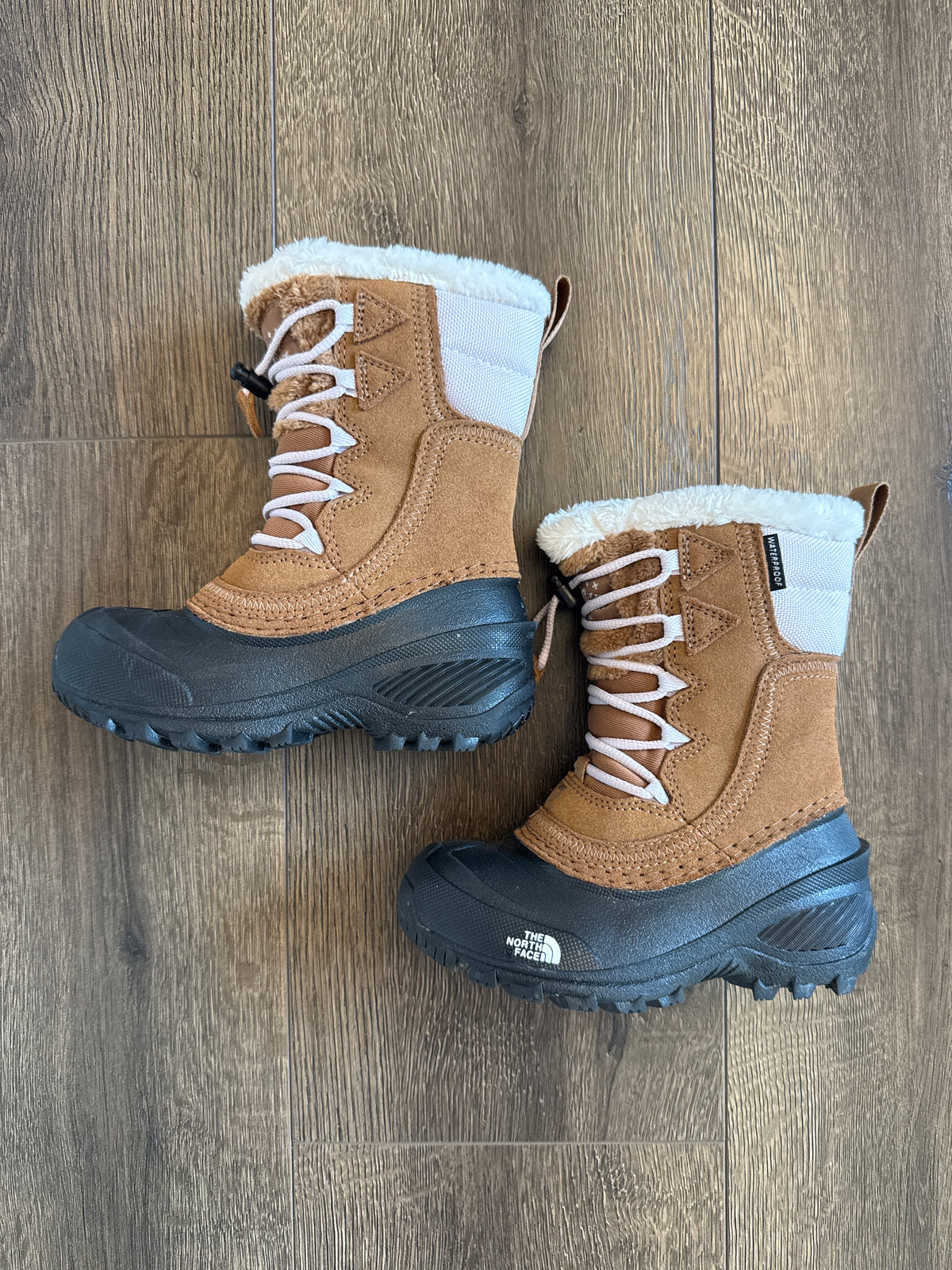 #173 EUC 10c The North Face girl snow boots