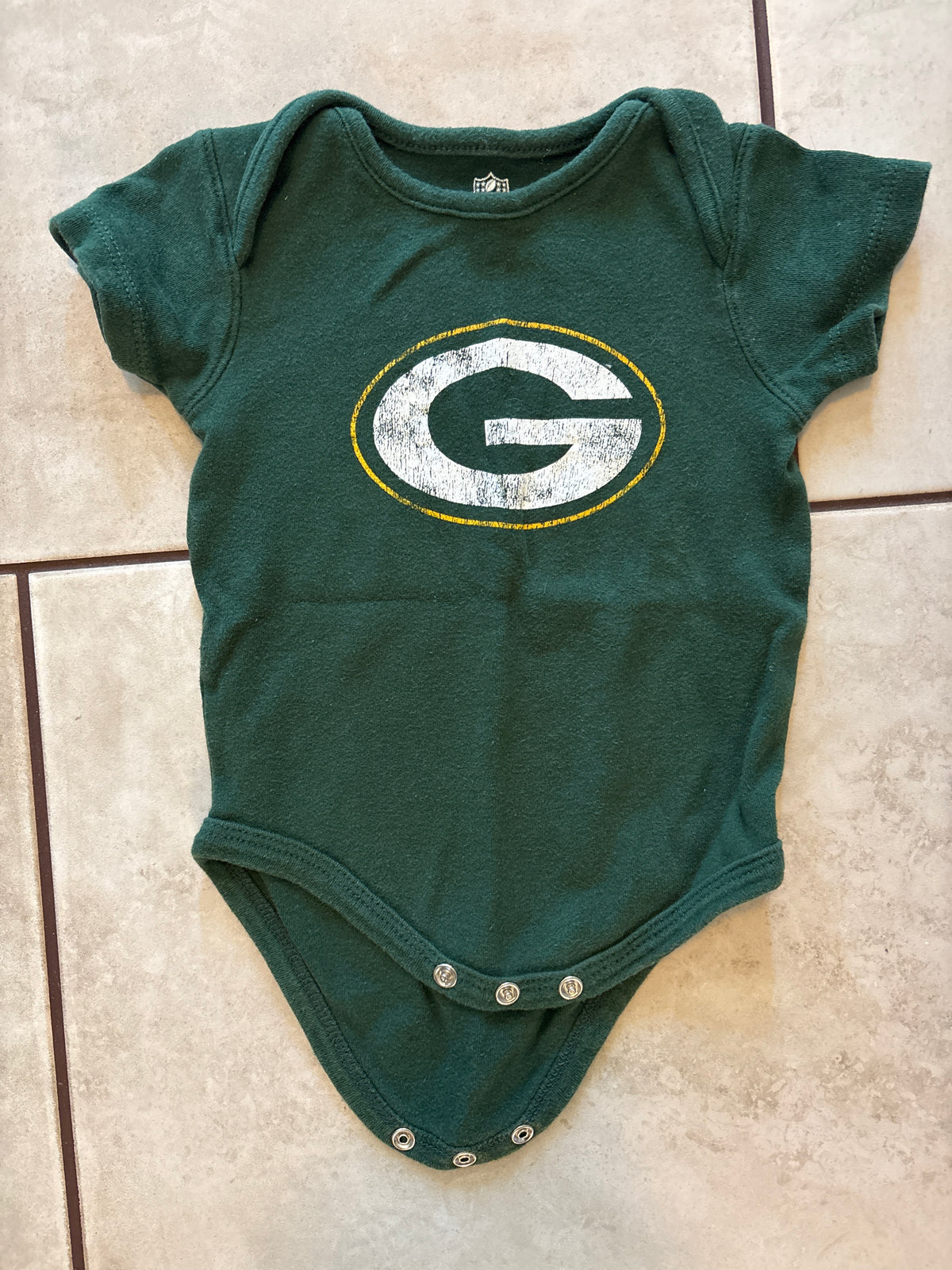 #166 6/9mo Green Bay Packers onesie