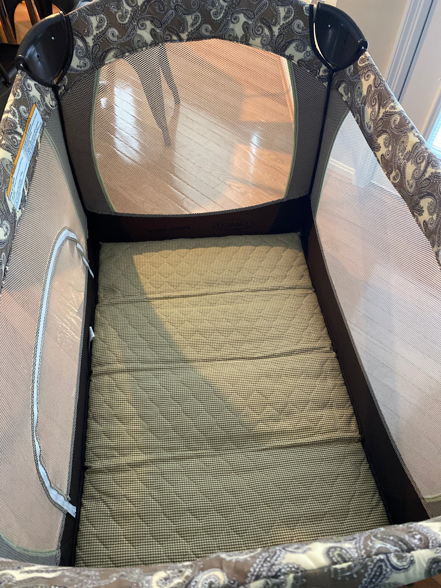 Seller #86 *REDUCED* Graco Pack n Play (brown and green paisley)