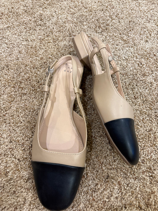 #47 women’s shoe size 8.5, tan and black dress shoe, a new day brand.