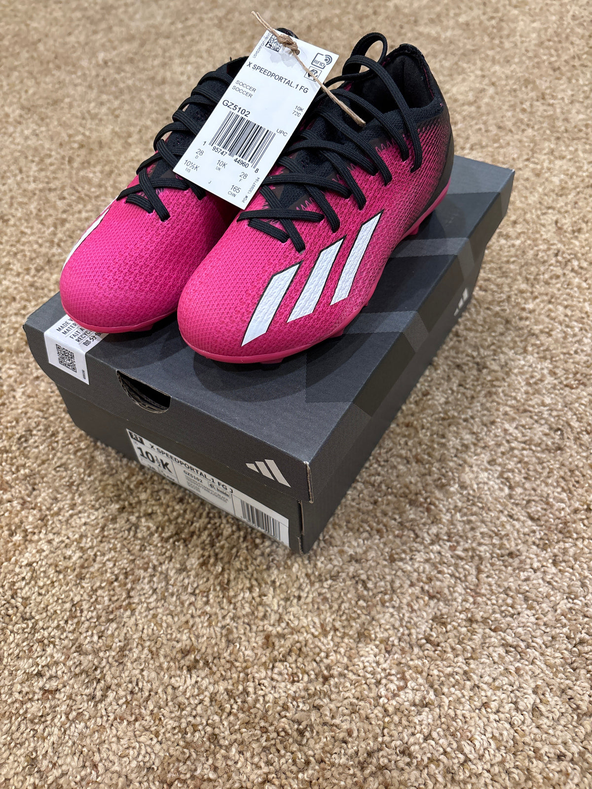 #47, Adidas pink/black soccer cleats Kids Size 10.5, new in box