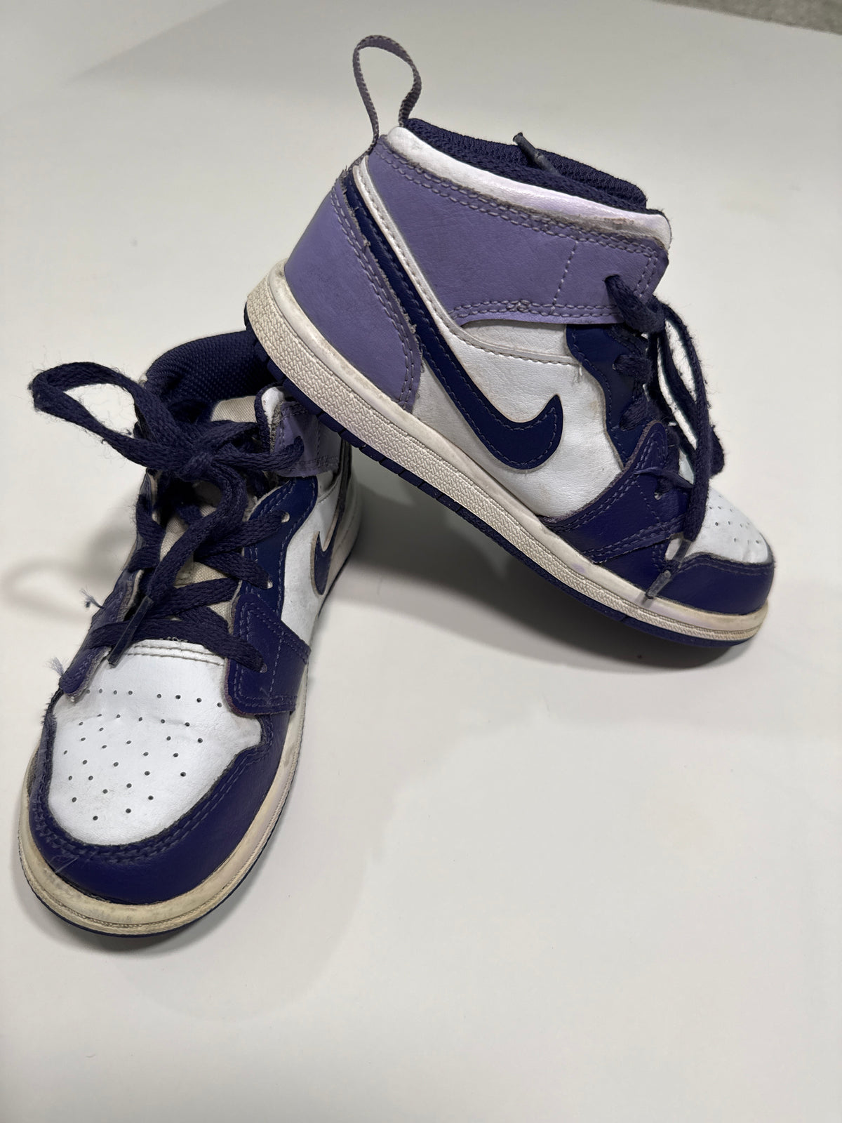 #64 Nike Purple Jordans Size 10