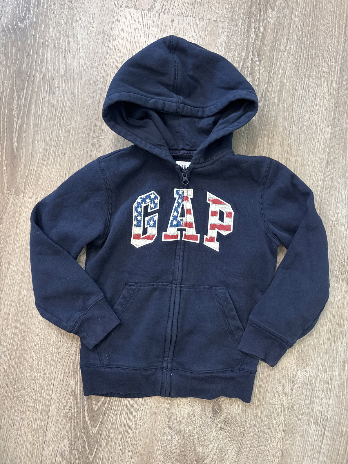 #149 Boys size 6/7 gap American flag zip up hoodie