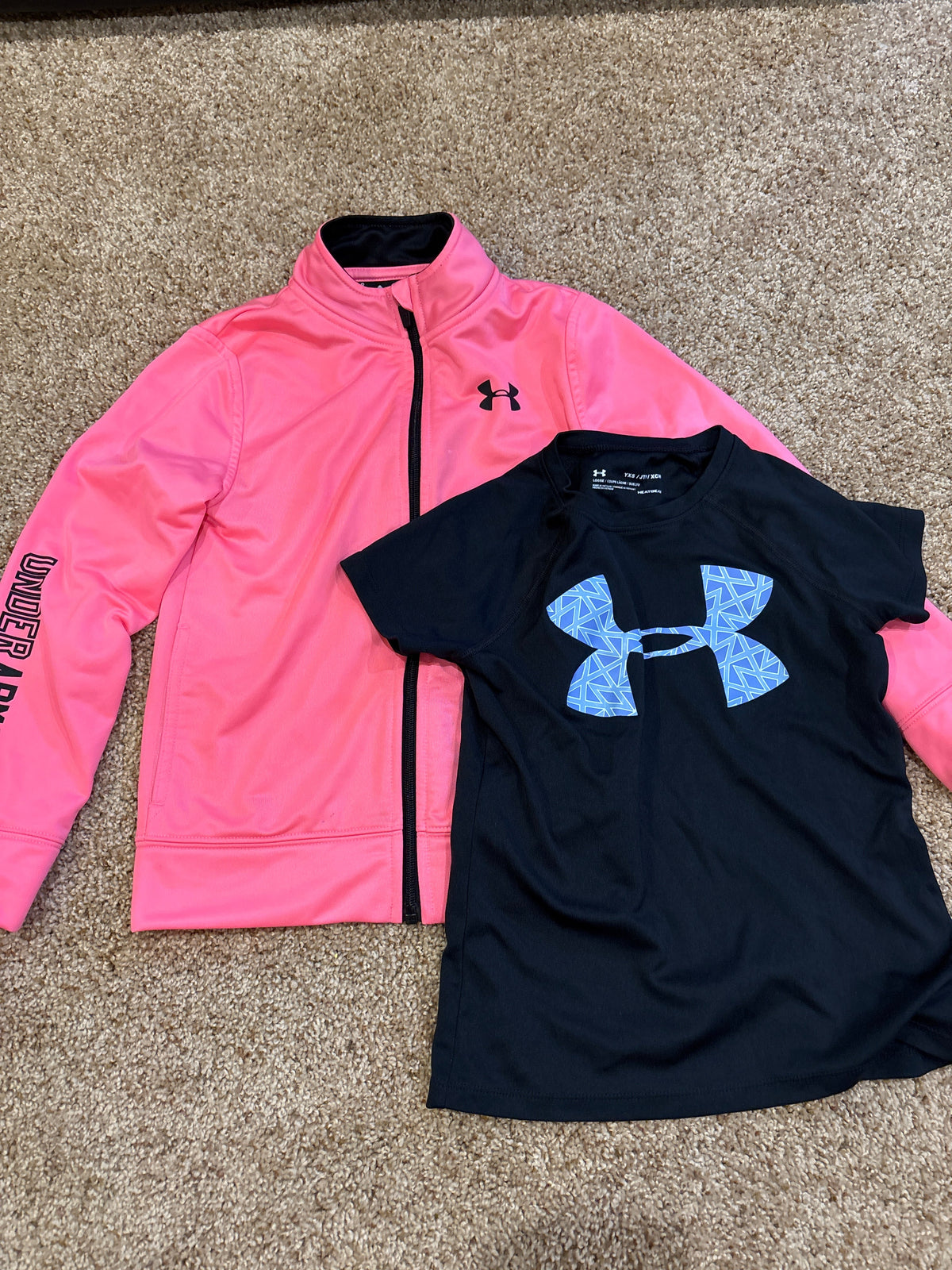 #47, girls size 6/XS, Under Armour pink full-zip sweatshirt and black short sleeve performance shirt