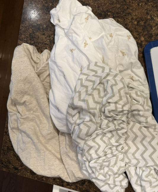 #49 Bassinet sheets - 2 Burt's Bees, 1 Amazon