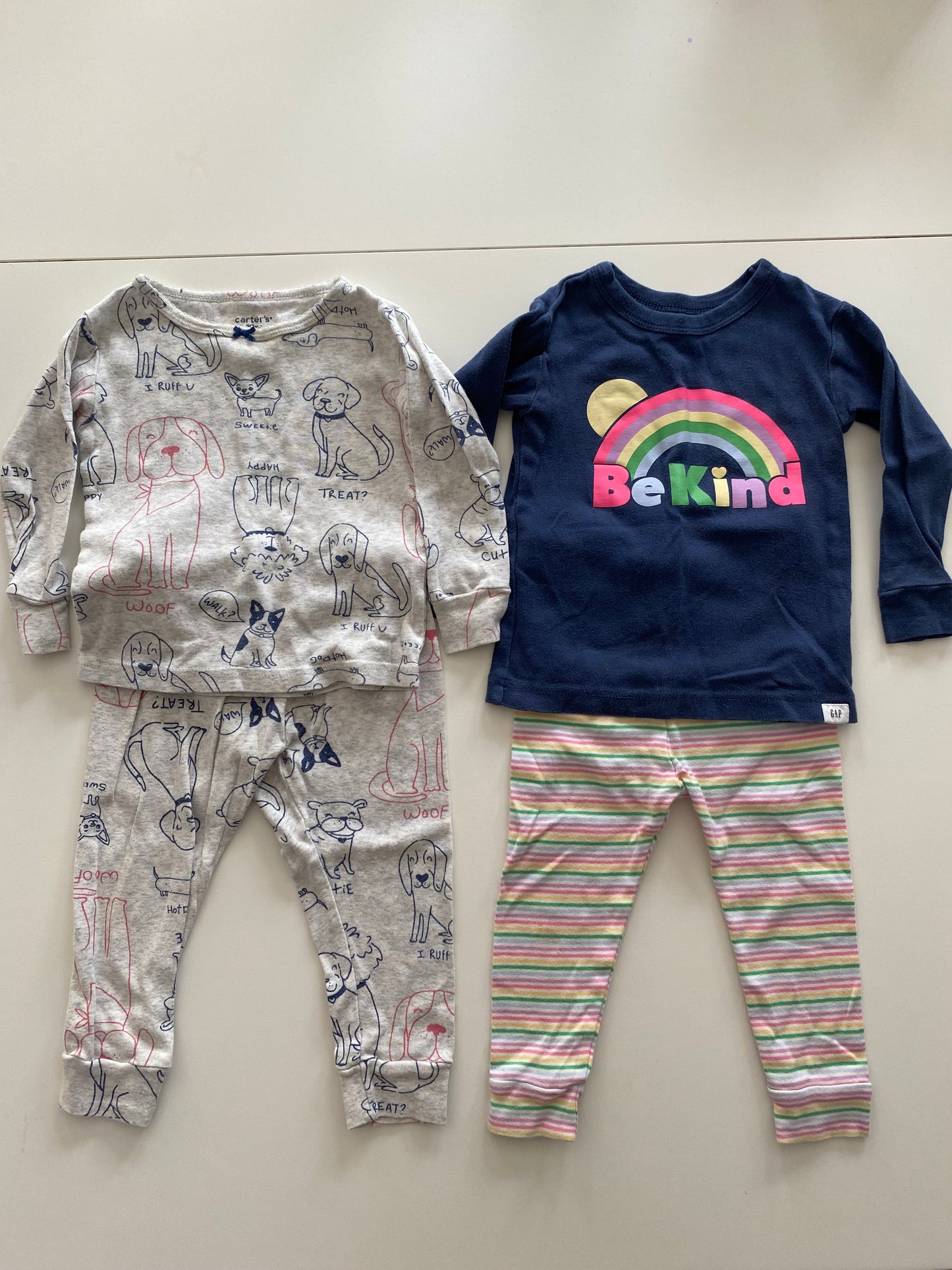 #84B-Gap blue rainbow and stripe pajamas and Carter’s gray puppy pajamas Girls 18M