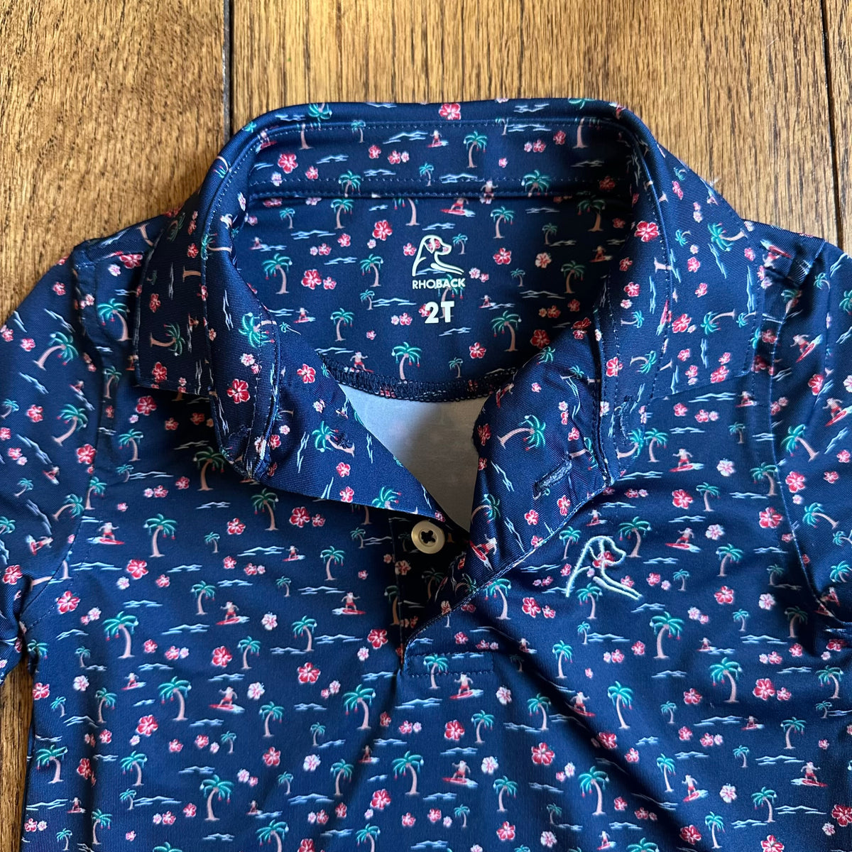 #113	EUC Boys Rhoback Palmtree Navy Golf Polo, size 2T