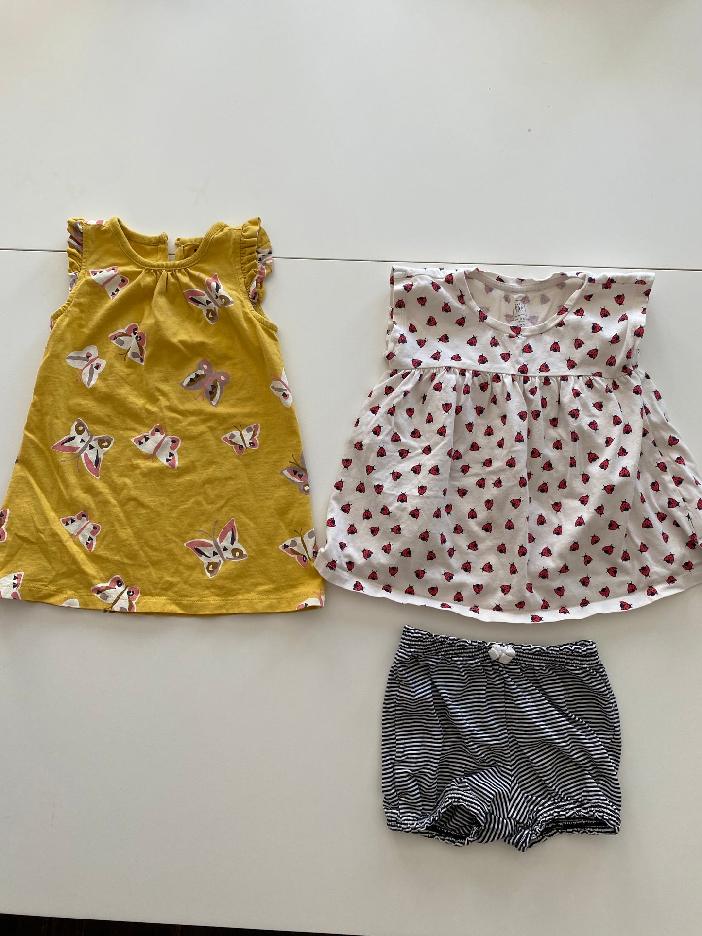 Gap Ladybug tunic with black/white stripe bubble shorts and Tea yellow butterfly print dress Girls 18-24M