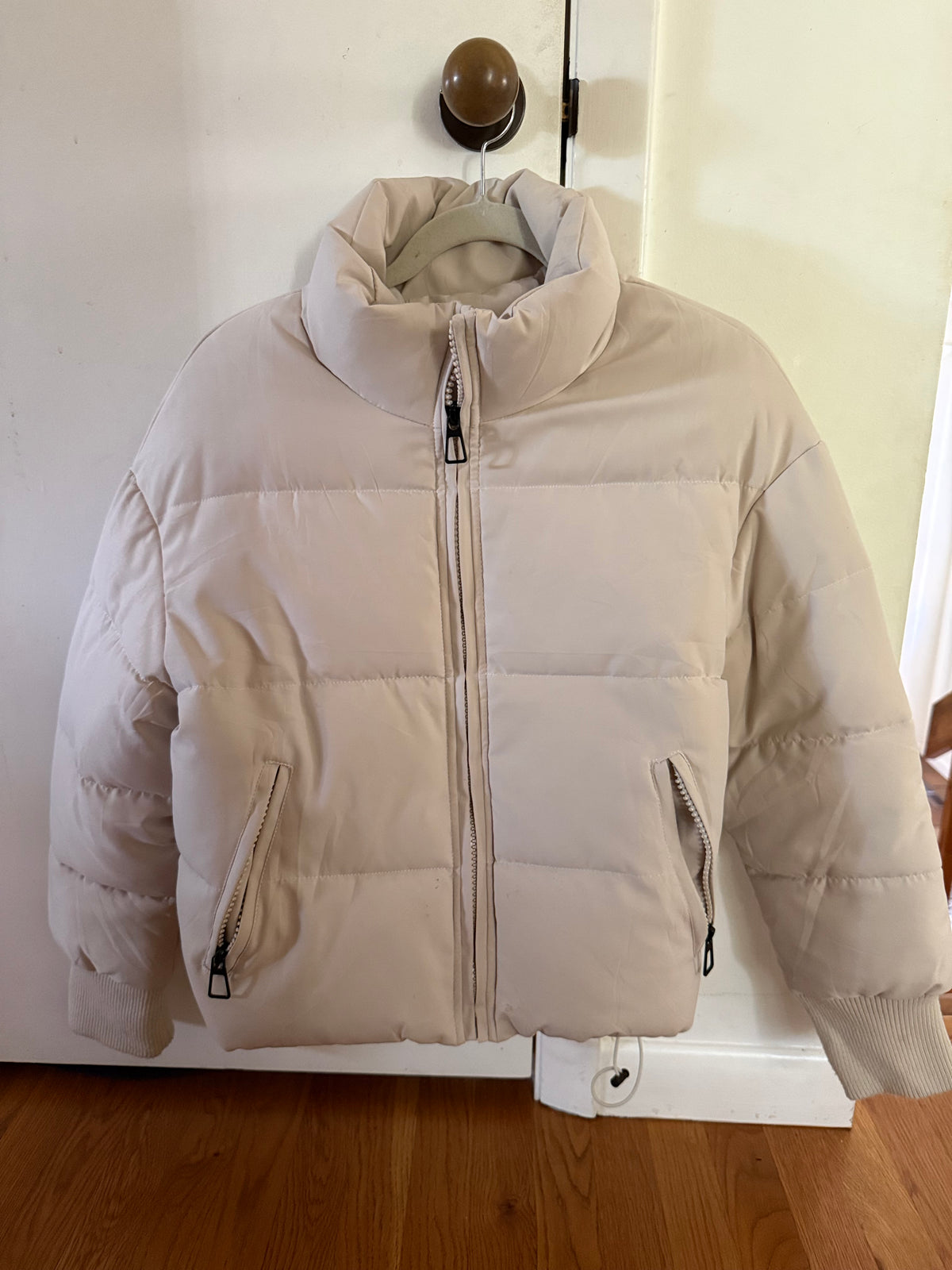 Seller #152 - women’s size small cropped beige puffer coat