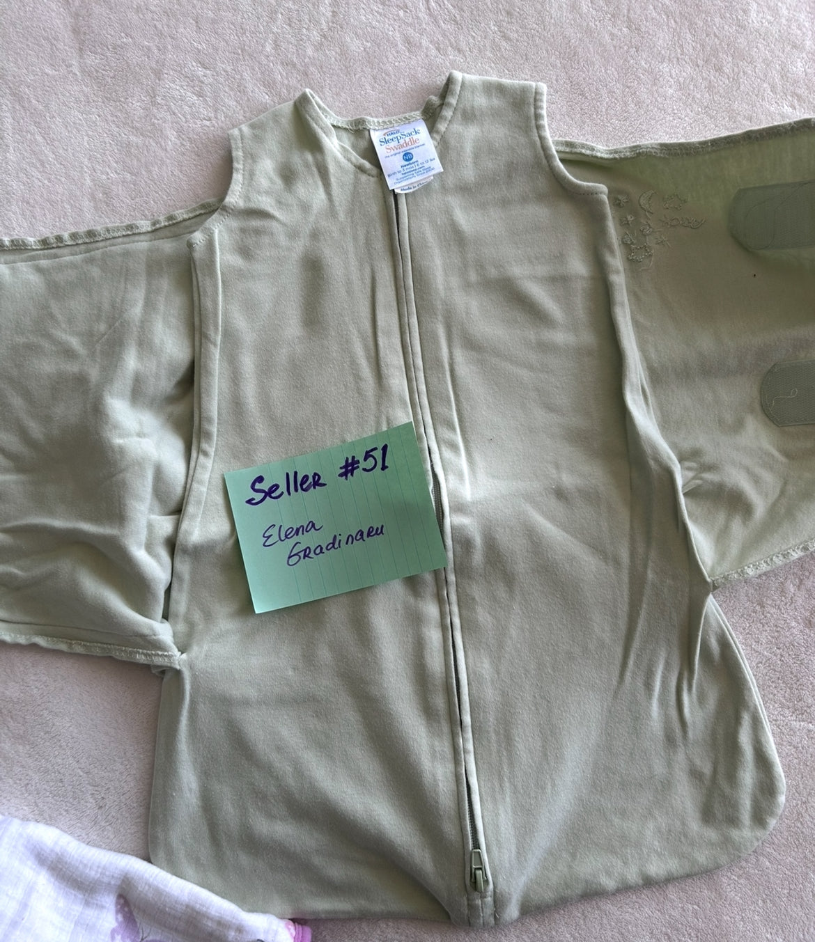 Seller #51 Sleep Sack Swaddle/newborn size never used