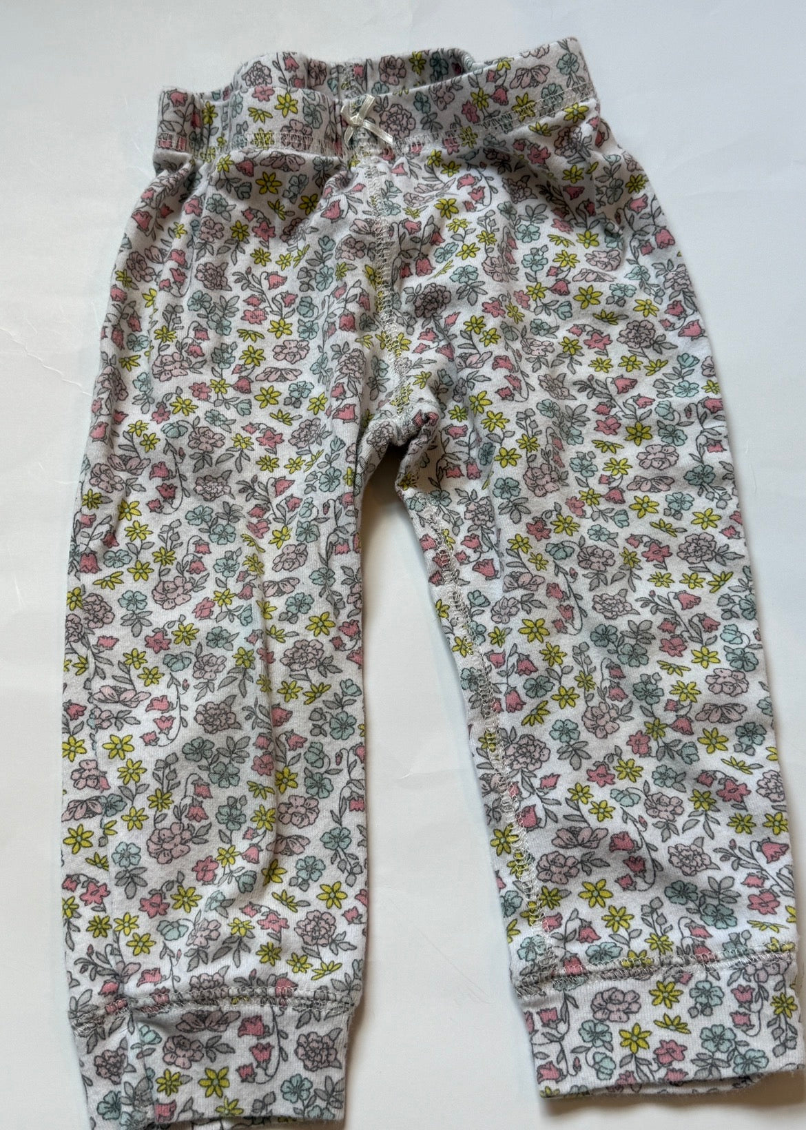 #170 Carters pants bundle (3)—Denim color leggings, white with pastel flowers, black with flowers girls 18 months